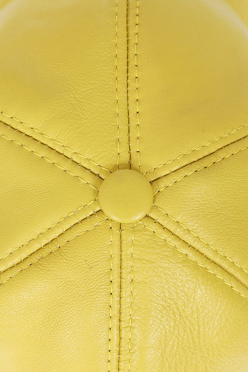 Premium yellow leather baseball cap with curved peak and adjustable strap by LLD Original