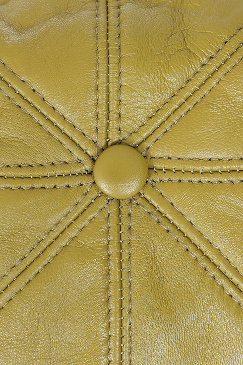 Olive lamb nappa leather flat cap in London style by LLD Original, showcasing a classic British headwear design.