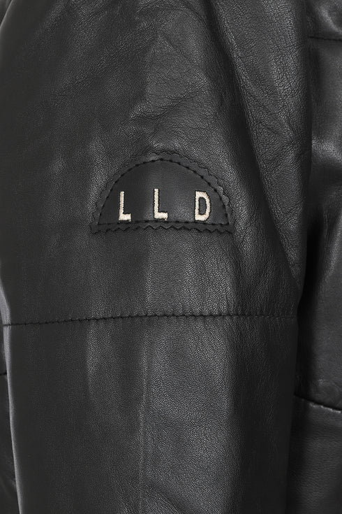 Women's black leather ¾ coat with fur trimmed hood from LLD Original, featuring a stylish collar and hip length design.